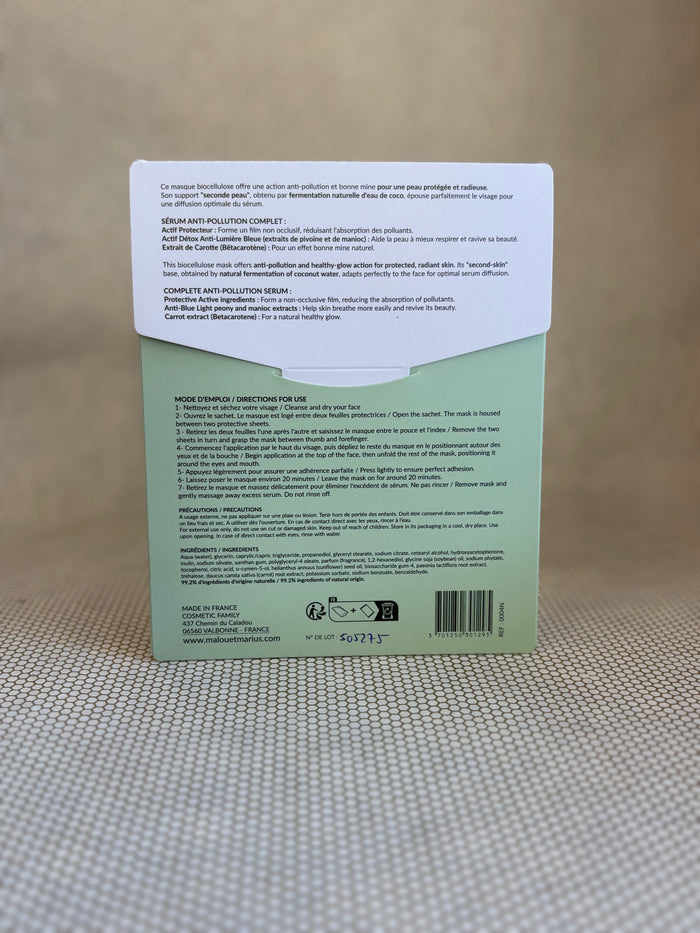 back of Malou & Marius anti-pollution detox mask white and green packaging on a neutral background