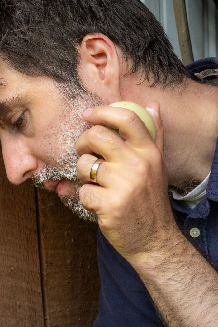 Rustic Strength, Nourish, 2.5oz Face Bar, Soothing Nettle being used on man's face
