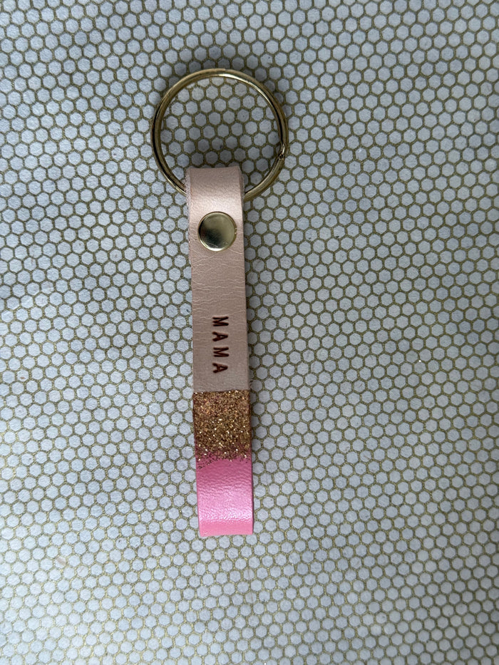 pink color keychains with leather straps and "mama" lettering on leather.