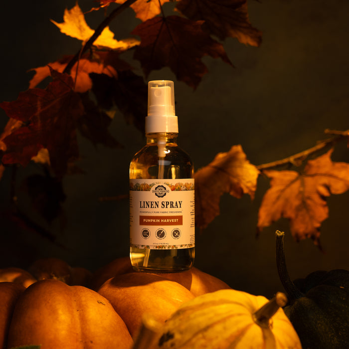 Rustic Strength - Linen Spray bottle set on a pumpkin with a dark fall leaves motif