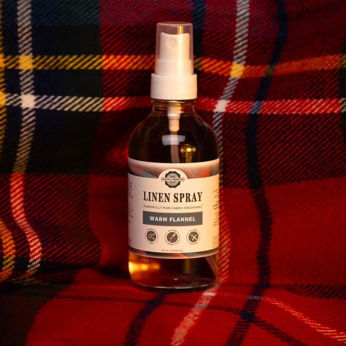 Rustic Strength - Linen Spray | 4 oz Glass Spray Bottle | Warm Flannel on a red-dominant flannel background