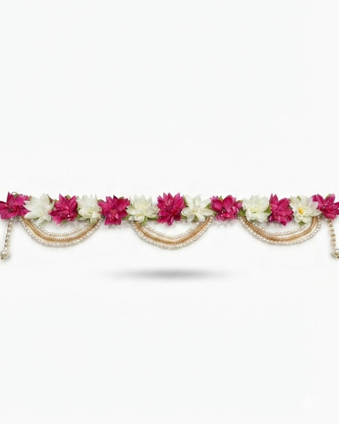 Magenta and ivory floral toran with pearl and gold bead chain for main door