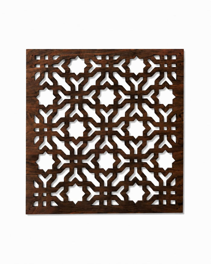 Dark brown square wooden trivet with symmetrical Moroccan geometric cutwork design